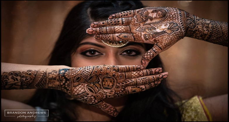 Bride Posing Back Hand Floral Mehndi Design with Diamond Jewellery