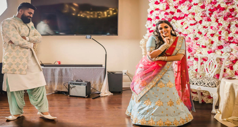 Indian Dance Choreographer_Gulabi Dance Co_bride and groom with the entourage