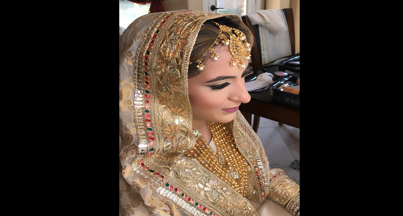 Indian Wedding Hair and Makeup_Queens Skin Care Solutions_Bride wearing gold motiff
