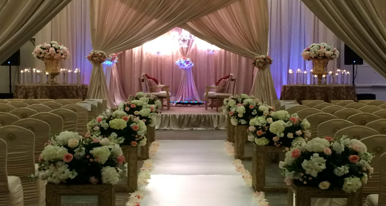 Indian Wedding Venue_Marriott Quorum by the Galleria_walking down the aisle